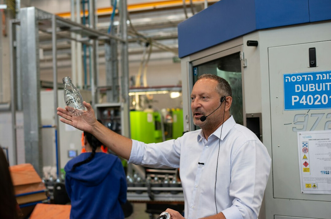 Trainer explaining programming concepts to employees