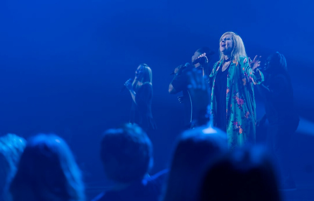 Businesswoman presenting to a corporate audience